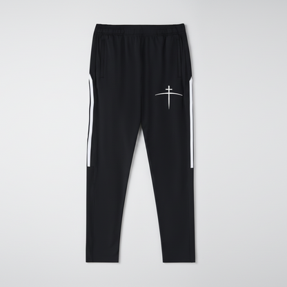 Black pants with a white cross design on a light gray background